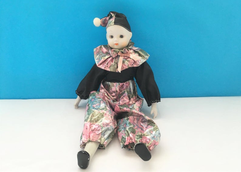 sad clown porcelain doll