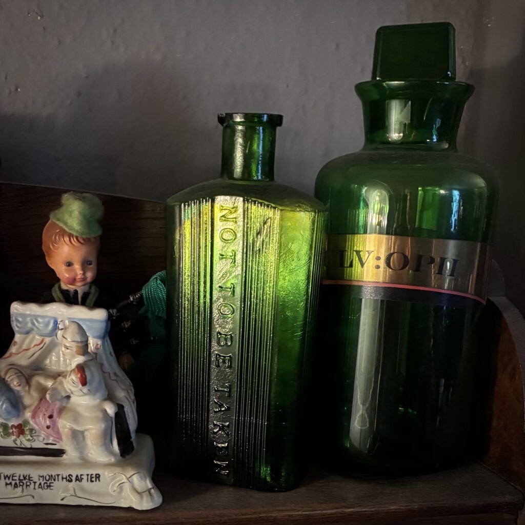 Decorating with Vintage for Halloween Blog - Old Green Glass bottles