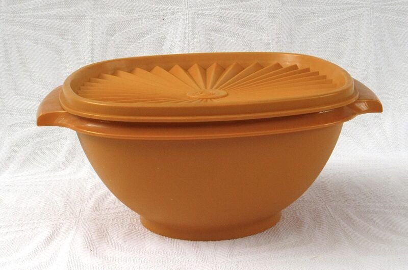 Vintage 1970s Tupperware Harvest Orange Rounded Container Fan Lid Image